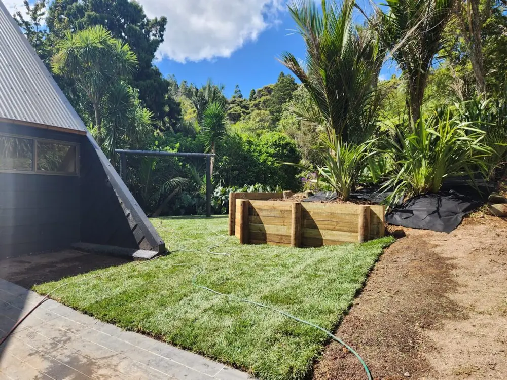 After: Timber retaining wall and ready lawn levelling in Titirangi