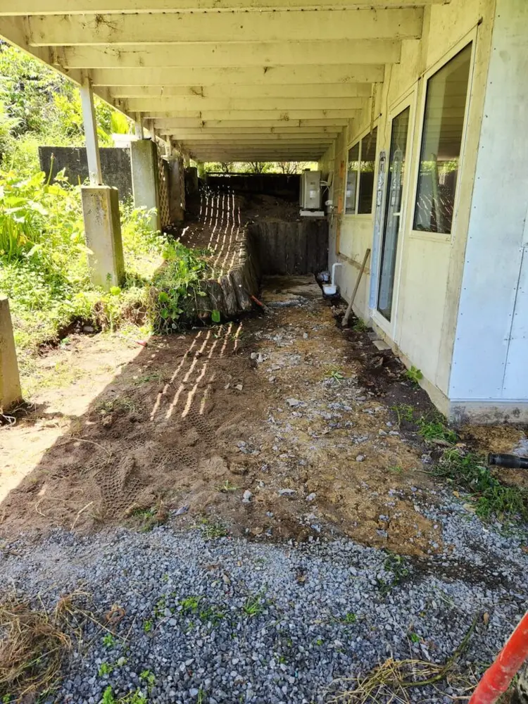 Before: Under deck excavation, retaining wall and paving in Henderson