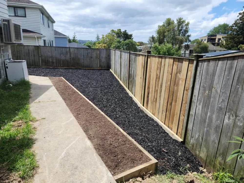 After: Retaining wall and backyard landscaping in Ranui